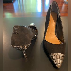 Black metal pointed heels